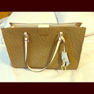 Calvin Klein logo brown with white details